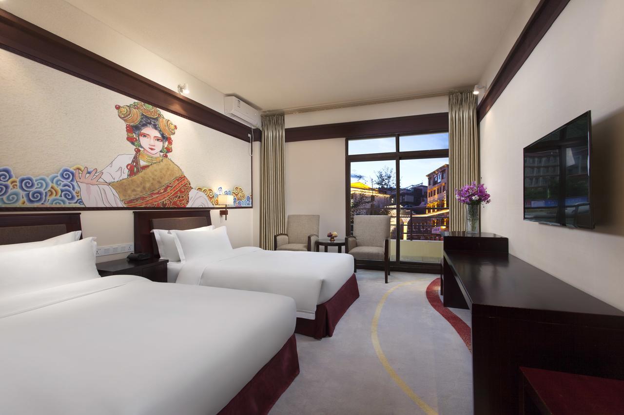 Отель Ramada Encore Daocheng Yading Экстерьер фото